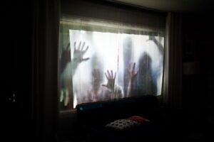 creepy-zombie-hands-on-a-window.jpg